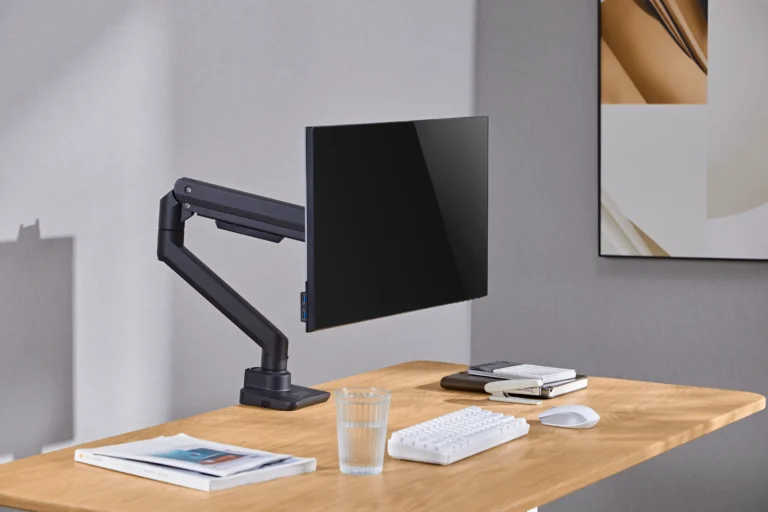 newstar premium single monitor arm heavy duty aluminum and steel build in an office setting
